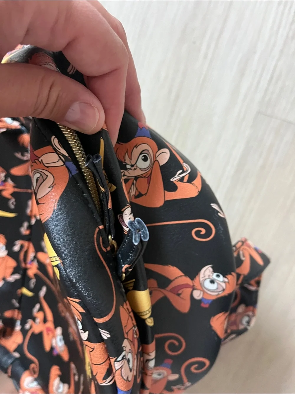Disney Black Backpack with Orange and Yellow  